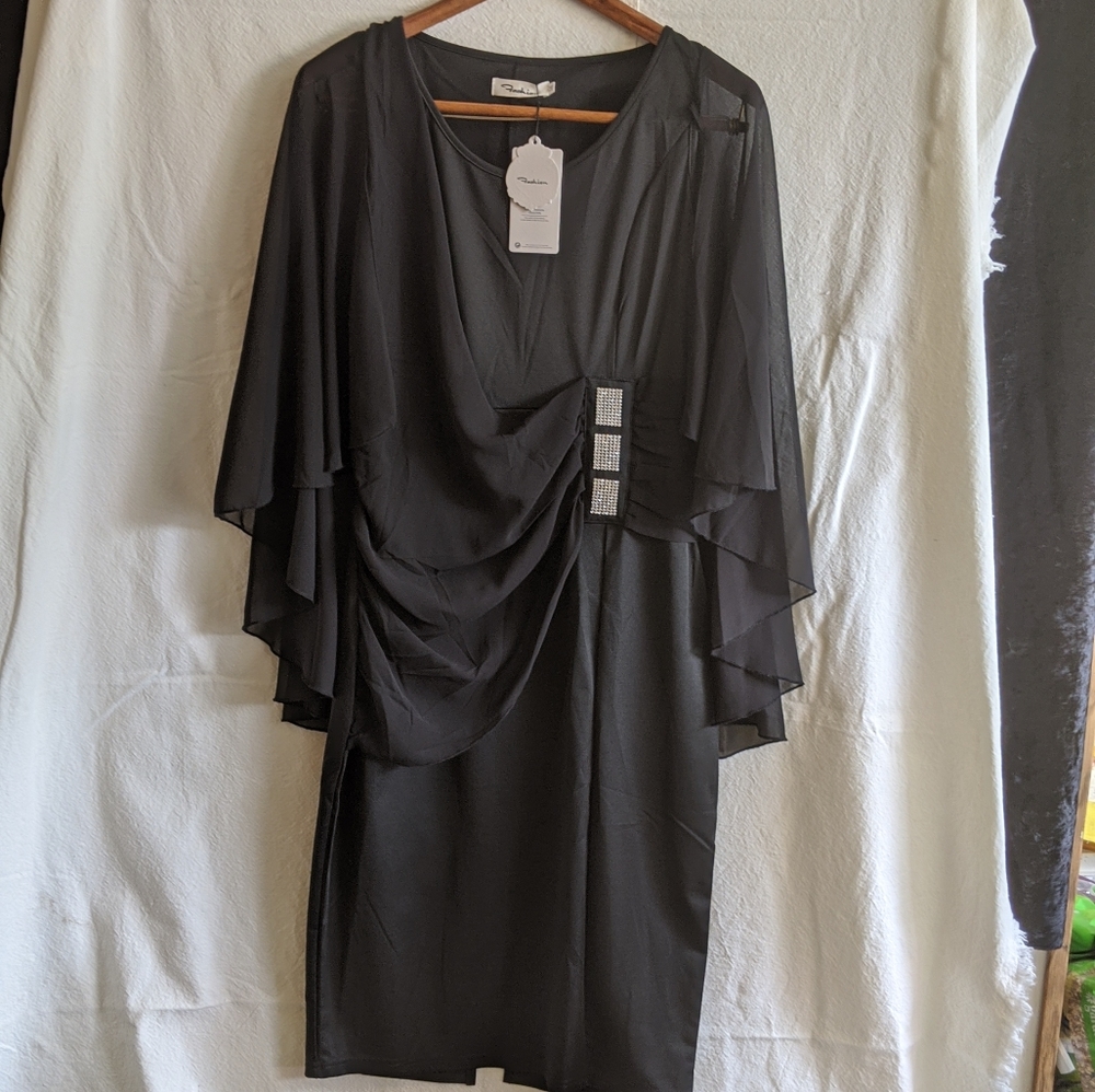 Fashion brand, black dress with full sleeves.  New, with tags.  Size Medium